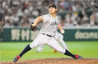  ?? TORU HANAI AP ?? Shota Imanaga of Japan throws in a quarterfin­al game vs. Italy in the 2023 World Baseball Classic.