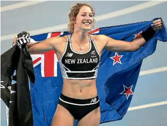  ?? PHOTO: PHOTOSPORT ?? New Zealand’s Eliza Mccartney celebrates her memorable bronze in the Rio women’s pole vault .