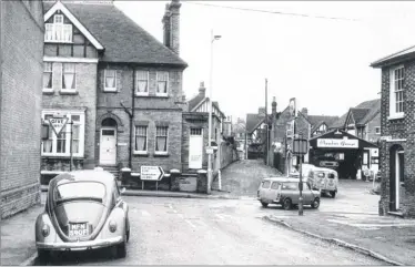  ??  ?? Somerset Road at its junction with North Street in February 1973, and a rare look at this key junction, prior to the commenceme­nt of the Ringway works. The picture shows one of the doomed properties in the path of the Ringway and also Chambers Garage,...