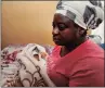  ?? PICTURE: SIMPHIWE MBOKAZI ?? GAVE BIRTH AT STATION: DRC migrant Francine Ngalula Kalala nurses her baby Emmanuella.