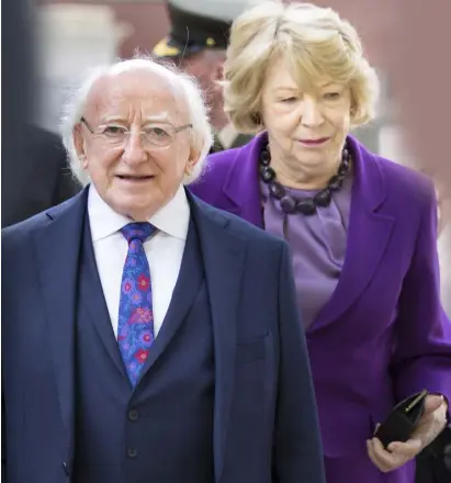  ??  ?? SYMBOLIC ROLE: President Michael D Higgins and his wife Sabina. Photo: Tony Gavin