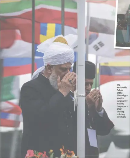  ??  ?? The worldwide Caliph of the Ahmadiyya Muslim community leading the prayers after the flag hoisting ceremony