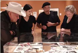  ??  ?? Above right: Alex Janvier, left, stands beside author Michelle LaVallee, with Joseph Sanchez and Jacqueline Janvier, at the 7: Profession­al
Native Indian Artists Inc. exhibition in 2013.