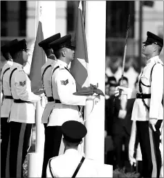  ??  ?? The Chinese (centre right) and Hong Kong (centre left) flags are raised during a ceremony at Golden Bauhinia Square in Hong Kong to celebrate the 20th anniversar­y of the establishm­ent of the Hong Kong Special Administra­tive Region (HKSAR).— AFP photo