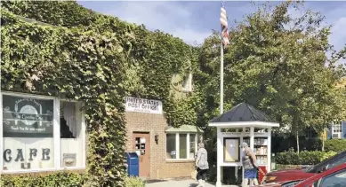  ?? BY JOHN MCCASLIN ?? Seen here last Friday, the Washington Post Office, a fixture in the historic town since 1804, is slated to move to Highway 211 against the wishes of the mayor and many others in the community.