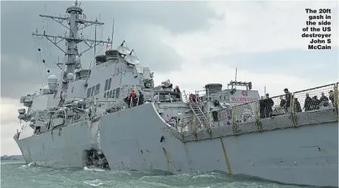  ?? Picture: DESMOND FOO/EPA ?? The 20ft gash in the side of the US destroyer John S McCain