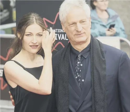  ??  ?? 0 Kelly Macdonald and Marc Turtletaub at the premier of Puzzle at the Edinburgh Internatio­nal Film Festival