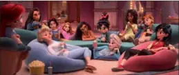  ?? ACCOUNT PHOTOS FROM DISNEY’S TWITTER ?? Mulan (right) dressed in casual, modern clothes in Disney’s latest animated film Ralph Breaks the Internet. The film, which features all Disney princesses, is set for release on Nov 21.