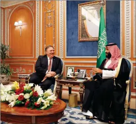  ?? LEAH MILLIS / POOL VIA AP ?? U.S. Secretary of State Mike Pompeo meets with the Saudi Crown Prince Mohammed bin Salman on Tuesday in Riyadh, Saudi Arabia.