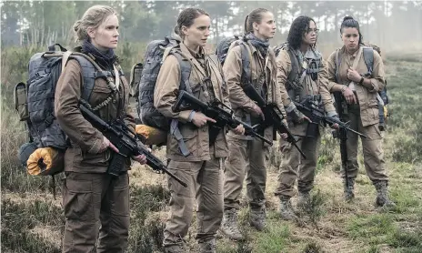  ??  ?? Jennifer Jason Leigh, left, Natalie Portman, Tuva Novotny, Tessa Thompson and Gina Rodriguez prepare to explore the strangenes­s of “the Shimmer.”