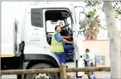  ??  ?? Collette Goby is also a solid waste removal truck driver.