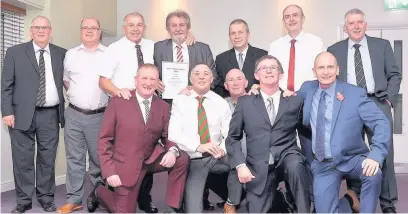  ??  ?? Some of the Widnes Football Developmen­t Committee members with Lifetime Achievemen­t winner Ronnie Hough (left to right, standing) Mick Millea, Chris Chesters, Bob Whitley, Ronnie Hough, Billy Jones, Councillor Phil Harris, Gary Pattullo; (left to...