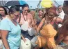  ?? RICK JERVIS, USA TODAY ?? Residents of Arecibo, Puerto Rico, line up Saturday to siphon drinking water from a fire hose.