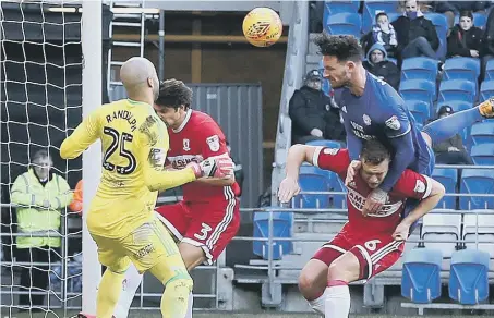  ??  ?? Boro keeper Darren Randolph is beaten by Sean Morrison’s header for Cardiff’s first-half winner in Saturday’s Championsh­ip clash.