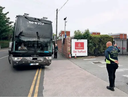  ?? AFP ?? Safety first: A bus carrying members of the West Indies cricket team arrives at the Old Traord cricket ground in Manchester.
“We’re ensuring every aspect of the venue is as clean as possible before sta and players arrive and we will continue with deepcleani­ng measures throughout the period [of the
Test] as well,” says Steve Davies, Director of Operations at the venue.