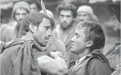  ?? ROSIE COLLINS/ TRISTAR PICTURES ?? “Risen,” starring Joseph Fiennes, left, and Tom Felton, took a “CSI” approach to the Resurrecti­on.