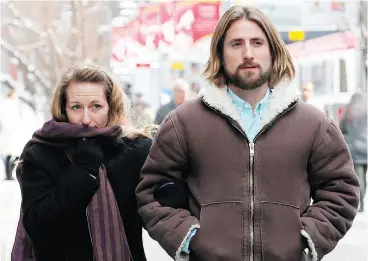  ?? TODD KOROL / THE CANADIAN PRESS FILES ?? David and Collet Stephan leave court in Calgary in March. They were found guilty last year in the death of their son, whom they treated with natural remedies.