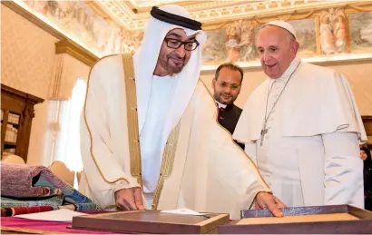  ?? AFP File ?? Sheikh Mohamed interacts with Pope Francis at the Vatican in 2016. The pontiff will visit the UAE in February next year. —