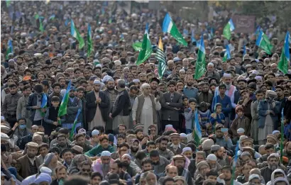 ?? AFP ?? Activists of the Jamaat-e-Islami Pakistan gather to mark Kashmir Solidarity Day in Islamabad on Monday. Kashmir Solidarity Day is observed in Pakistan on February 5 to show support for those living in Indian-administer­ed Kashmir. —