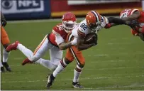  ?? REED HOFFMANN — THE ASSOCIATED PRESS FILE ?? Cleveland Browns wide receiver Rashard Higgins (82) is tackled by Kansas City Chiefs safety Tyrann Mathieu (32) after catching a pass during the second half of a divisional-round game Sunday, Jan. 17. in Kansas City.