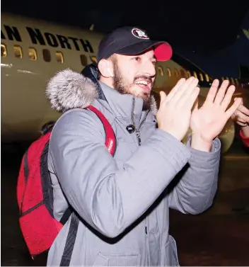  ?? JONATHAN HAywARD/THE CANADIAN PRESS ?? Defensive back Anthony Cioffi and the Redblacks arrive in Edmonton on Tuesday for Sunday’s Grey Cup game against the Calgary Stampeders.