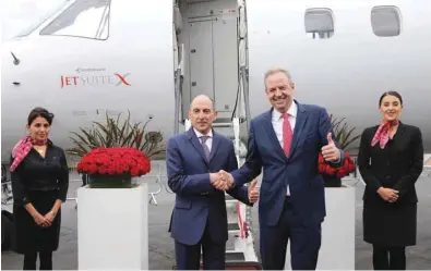  ??  ?? Qatar Airways Group chief executive Akbar al-Baker with JetSuite Inc founder and CEO Alex Wilcox.