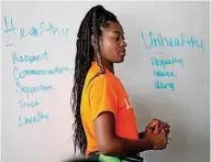  ??  ?? Del City high school student Lexi Pogue leads a discussion during a Teen emPower session at Taft Middle School.