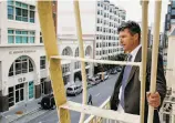  ??  ?? Mike Anderer of De Marillac Academy overlooks the future home of Dave Eggers’ writing program from his school.