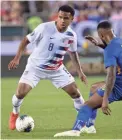  ??  ?? U.S. midfielder Weston McKennie dribbles against Curacao’s Leandro Bacuna.