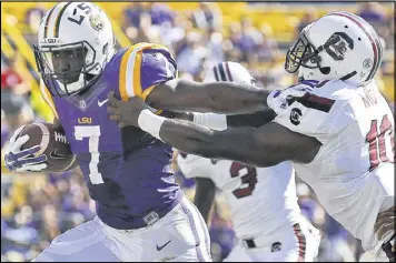  ?? JONATHAN BACHMAN / AP ?? LSU running back Leonard Fournette ran for 158 yards in three quarters in a game relocated to Baton Rouge because of the South Carolina floods.