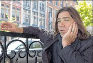  ?? CP PHOTO ?? Alan Doyle speaks during an interview in Toronto in 2012. Doyle is one of several Canadian musicians taking a key role behind the scenes in the developmen­t of musicals.