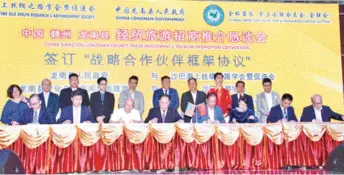  ??  ?? Standing: Chong (fifth right), Zhang (third right) and Tsang (second right) witness the signing ceremony to establish strategic collaborat­ion between the Sabah Maritime Silk Route Research and Advancemen­t Society, SUCCC, Satta and Malaysia Maritime Silk Route Research Society and their China partners.