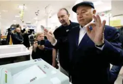  ??  ?? Former mayor of Moscow Yuri Luzhkov gestures after casting his ballot at a polling station during a parliament­ary election in Moscow yesterday.