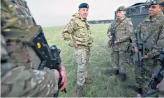  ??  ?? General Sir Nick Carter, above, and right with soldiers of 1st Battalion Mercian Regiment on Salisbury Plain