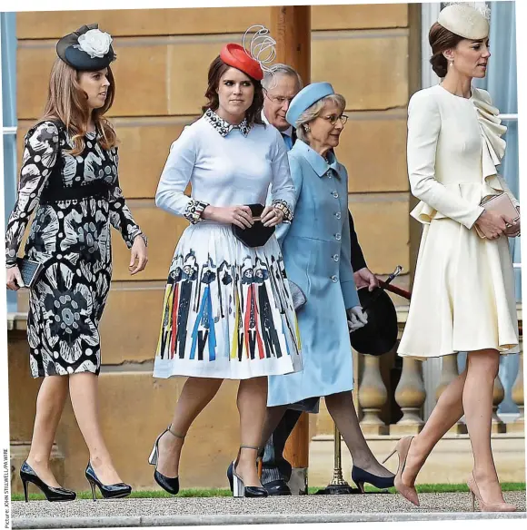  ??  ?? Beat that: Kate eclipses the Princesses at the Buckingham Palace garden party this week