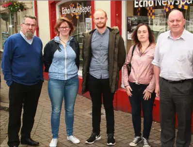  ??  ?? Echo staff members John Walsh, Anna Hayes, Padraig Byrne, Sarah Bermingham, Dan Walsh and Brendan Keane outside the company’s Enniscorth­y office last Friday.