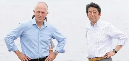  ??  ?? Japanese Prime Minister Shinzo Abe (right), and Australian leader Malcolm Turnbull walk along Sydney Harbour on Saturday.