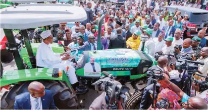  ?? President Muhammadu Buhari addresses farmers after he inaugurate­d the Plateau State Tractor Ownership Scheme in Jos yesterday Photo: State House ??