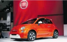  ?? Kevork Djansezian/getty Images ?? Chrysler unveiled the Fiat 500e, with a run to 96 km/h in less than nine seconds and a recharge time of a scant four hours.