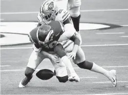  ?? WALLY SKALIJ L.A. TIMES ?? Rams quarterbac­k Jared Goff fumbles the ball, one of his three turnovers.