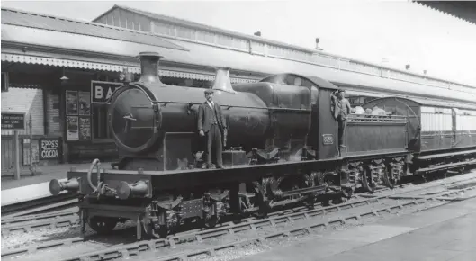  ?? J Randford Collection/Kiddermins­ter Railway Museum ?? A circa 1906 view at Bath station records ‘3521’ class 4-4-0 No 3540 facing Bristol and berthed in the centre road with a stopping train, its crew posing proudly for the camera. This class has an extraordin­ary history, with Nos 3521-40 built in 1887-89 as standard gauge 0-4-2Ts, while Nos 3541-60 date from 1888/89 as broad gauge ‘convertibl­e’ 0-4-2STs, with the latter modified to 0-4-2T in 1890/91 and then converted to standard gauge in 1892. The tinkering continued until by 1899 the 40 engines were all 0-4-4Ts with a tendency to derail, and so a programme of conversion to 4-4-0s ensued – No 3540 was duly outshopped in September 1900, and subsequent­ly it had a boiler upgrade in 1910 (to Standard No 3), was superheate­d from November 1912, and then served in that form until finally withdrawn in November 1927.