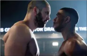  ?? METRO GOLDWYN MAYER PICTURES — WARNER BROS. PICTURES ?? Florian Munteanu , left, and Michael B. Jordan appear in a scene from “Creed II.”