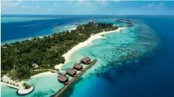  ?? ?? OZEN RESERVE BOLIFUSHI is flanked by sandy beaches. Below: The all-day dining restaurant, Vista Del Mar specialise­s in Maldivian cuisine.