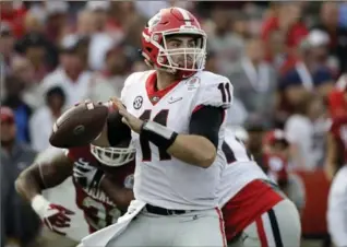  ?? ASSOCIATED PRESS FILE PHOTO ?? Jalen Hurts came within a single second of leading Alabama to a national football championsh­ip in his freshman season. Now, Jake Fromm, pictured, is on the cusp of a title in his first year at Georgia.