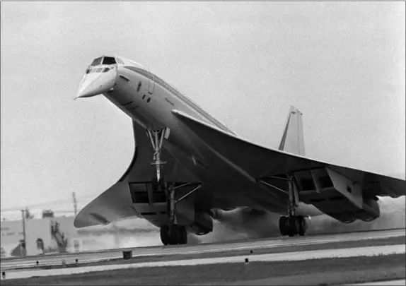  ?? PHIL SANDLIN — THE ASSOCIATED PRESS FILE ?? The Air France Concorde supersonic airliner touches down at Miami Internatio­nal Airport in Miami, Fla. The flight from Boston’s Logan Airport took about 80 minutes. The Concorde’s maiden flight was 50 years ago on.