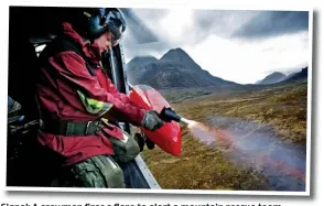  ??  ?? Signal: A crewman fires a flare to alert a mountain rescue team