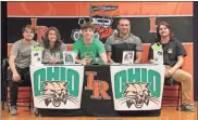  ?? Scott Herpst ?? On hand at LaFayette High School to watch senior basketball player Aidan Hadaway sign with Ohio University on Friday was Brodie Leiser, Melanie Hadaway, LaFayette head coach Hank Peppers and Joshua Leiser.