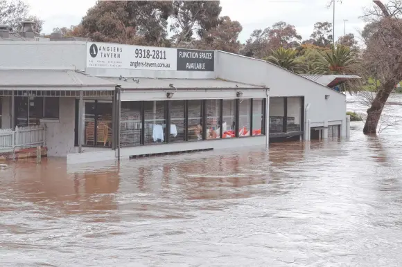  ?? ?? Water inundates the Anglers Tavern in Maribyrnon­g after a large rain system swept across Victoria. Picture: NCA NewsWire/David Crosling