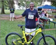  ?? BOB KEELER — MEDIANEWS GROUP ?? Timothy Blockson was the winner in a drawing for a mountain bike at this year’s Moyer Indoor/Outdoor 5K, held July 10 in Souderton.