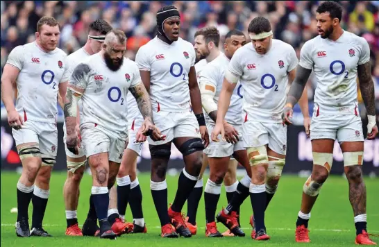  ?? COLORSPORT ?? Glum scrum: England suffered in Paris last week and cannot afford another defeat when they play Scotland today